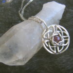 Celtic knot with ruby